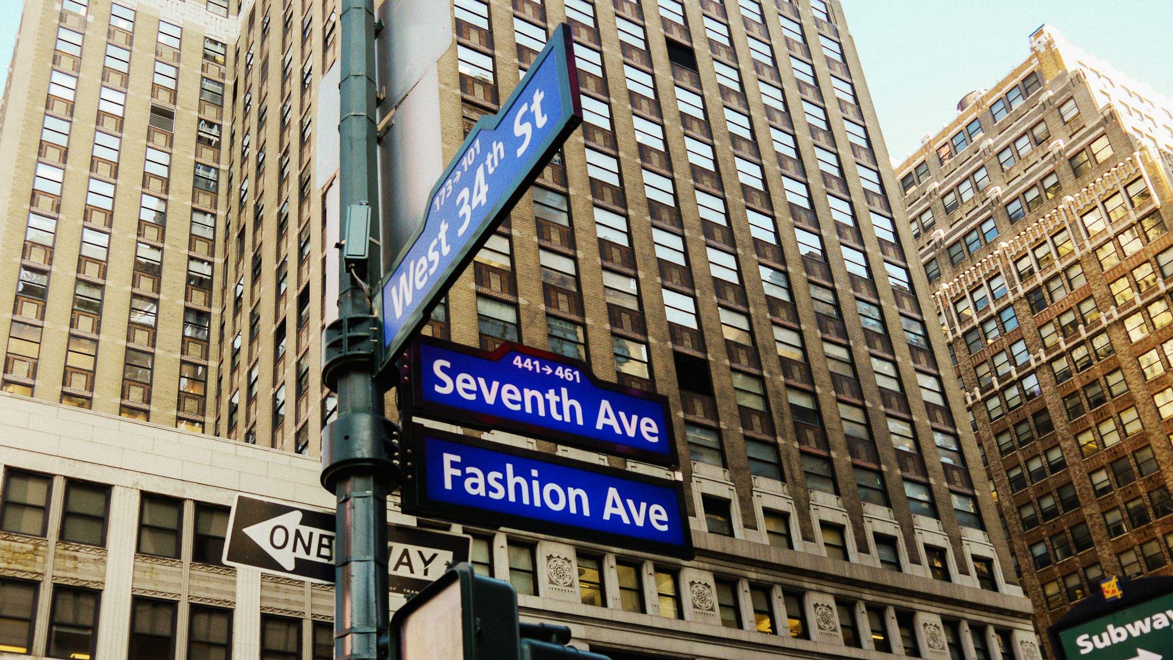 Street signs for West 34th Street, Seventh Avenue and Fashion Avenue in Manhattan